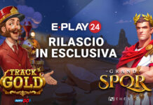 Giochi online, E-Play24 lancia in esclusiva “Grand SPQR” e “Track N’ Gold”: a maggio doppia novità firmata Nemesis e Play’n GO Promotional banner for E-Play24 announcing an exclusive release, with a train conductor on the left and a Roman hero on the right, against a rocky desert background; text reads 'RILASCIO IN ESCLUSIVA' and shows Track Gold and Grand SPQR logos.