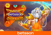 Casinò online, Betsson.it: l’intrattenimento si evolve tra grandi ritorni ed esclusive d’eccezione Promotional banner for Betsson's Gates of Betsson Super Scatter slot game, featuring a muscular Greek god with golden armor and lightning.