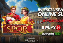 Slot online, un viaggio nell’antica Roma: Nemesis Games Studio lancia in esclusiva Grand SPQR Promotional banner for a casino game featuring a Roman man and woman in laurel crowns with a treasure chest overflowing with coins.