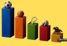Scomme online classiche e virtuali: ad aprile la spesa supera i 168 milioni di euro. Un terzo del mercato a Lottomatica. Sul podio anche Sisal e Snaitech Colorful stacked blocks with sports gear on top: soccer ball, basketball, tennis racket with ball, volleyball, and a horse statue on a yellow background. AGIMES logo in corner.