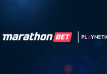 Casinò online, Marathonbet.it: nuova partnership con Playnetic Brand banner with MarathonBet on the left and Playnetic logo on the right on a dark blue gradient background.